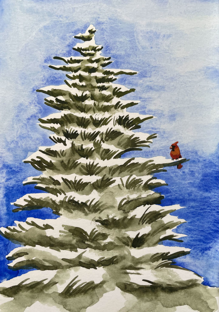 Fir tree blanketed with snow and red cardinal sitting on branch