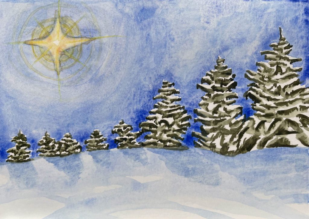 Line of fir trees blanketed in snow on snowy hill with bright yellow star